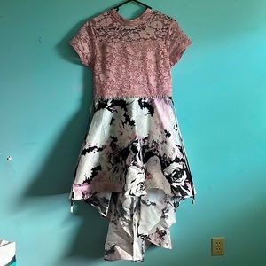 This beautiful dress is a Size 16.5.